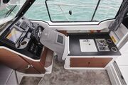 Jeanneau Merry Fisher 795 Series 2 - helm seat folds forward for easy access to galley Jeanneau Merry Fisher 795 - Series 2